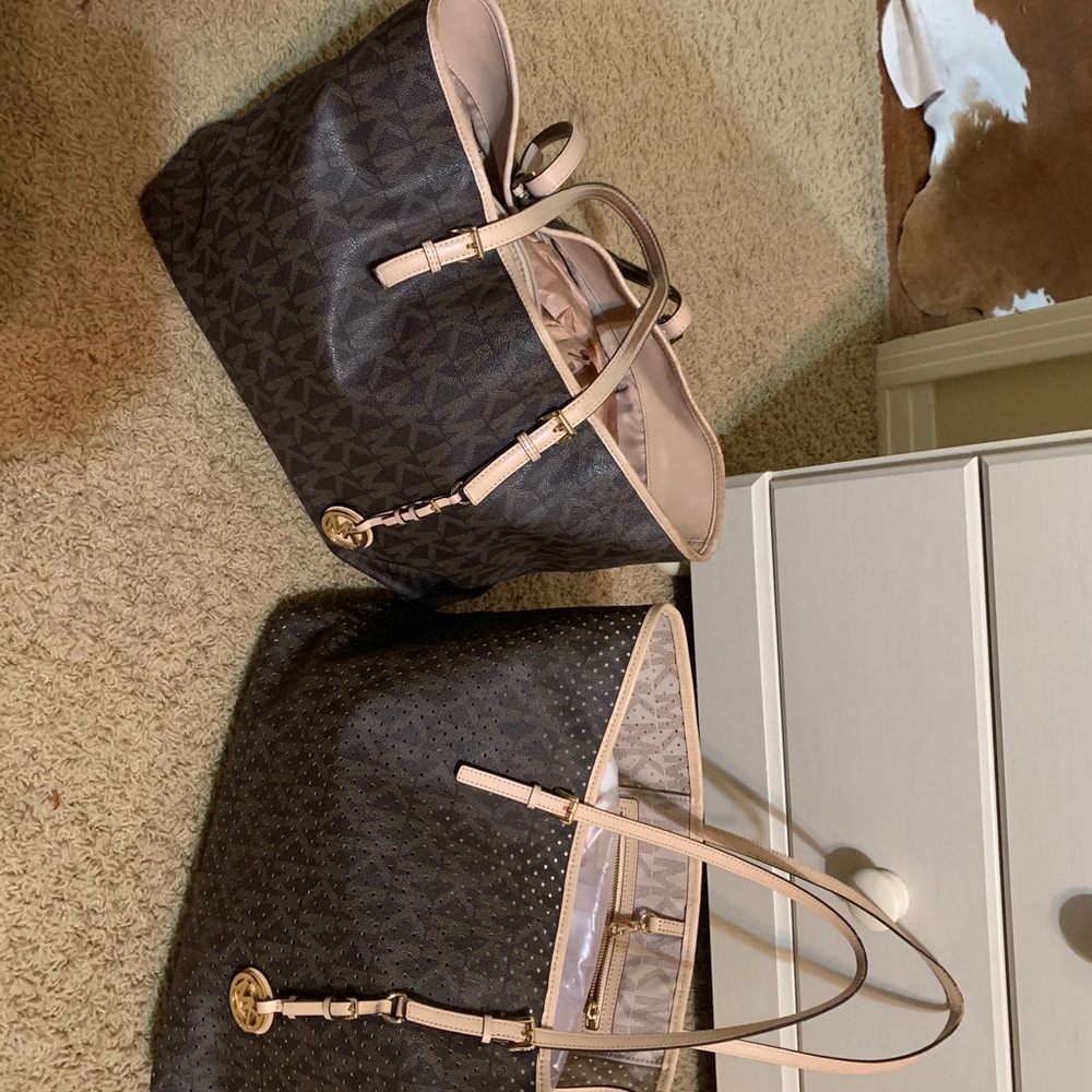Two large Michael Kors totes monograms signatured